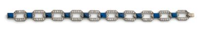 Bracelet articulé en or gris (750), formé...