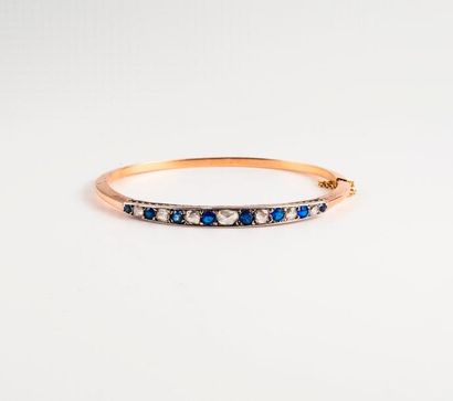 Bracelet jonc ouvrant en ors jaune et gris...