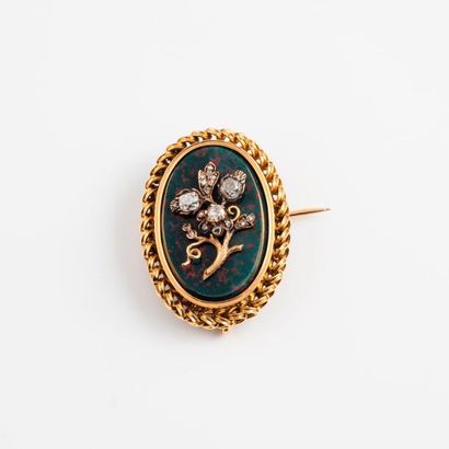 Broche-pendentif en or jaune (750) ornée...