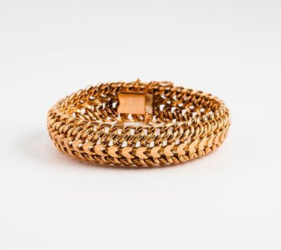 Bracelet en or jaune (750) à maille gourmette...
