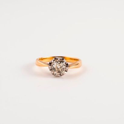Bague solitaire en ors jaune et gris (750)...