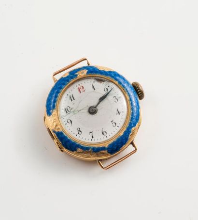 Boîtier de montre bracelet en or jaune (750).

Lunette...