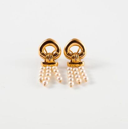 Paire de clips d'oreilles en or jaune (750)...