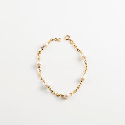 Bracelet en or jaune (750 à maille forçat...