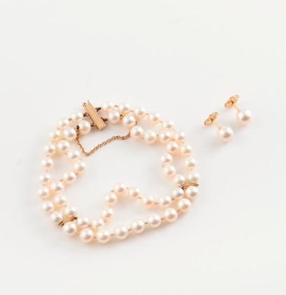 - Bracelet à deux rangs de perles blanches...