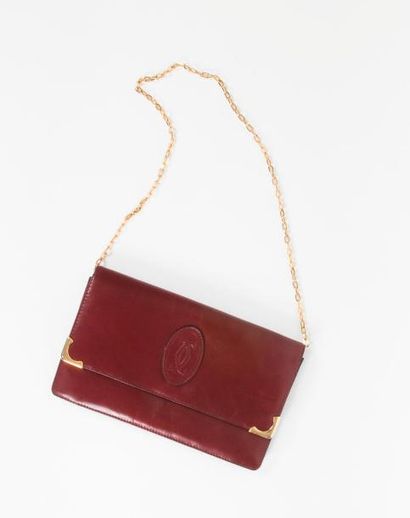 MUST de CARTIER


Pochette en cuir bordeaux.

Bandoulière...