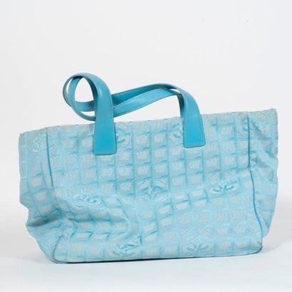CHANEL, Sportline


Sac porté épaule en toile...