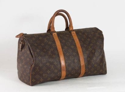 LOUIS VUITTON

Sac Keepall 45 et vache naturel...