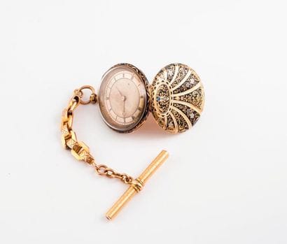 Montre de poche en or jaune (750).

Couvercle...