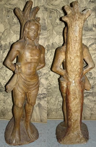 Statue de saint Sébastien en pierre patinée.

Dans...