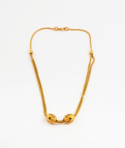 Collier en or jaune (750) formé d'une partie...