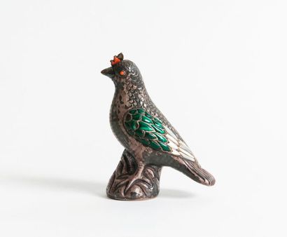 Oiseau posé sur une tertre en argent (min....