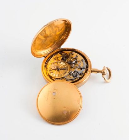 Montre de gousset en métal doré. 

Couvercle...