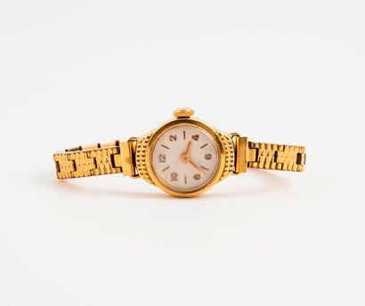 Montre bracelet de dame.

Boîtier rond en...