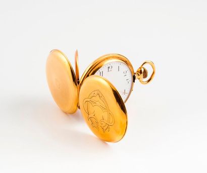 Montre savonnette en or jaune (750).
Couvercle...