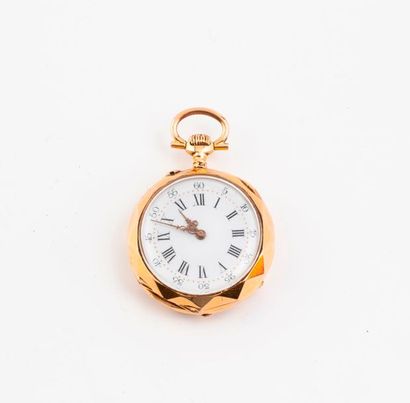 Montre de col en or jaune (750).

Le revers...