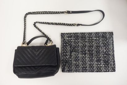 Sac à main en cuir noir à motif de chevrons....