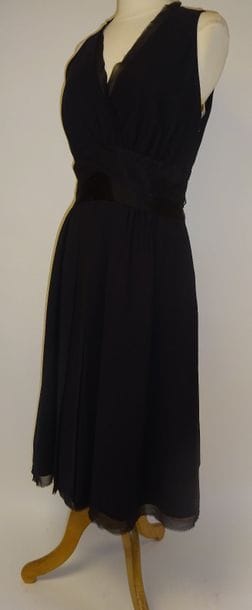 Dice Kayek


Robe en crêpe noire à décolletté...