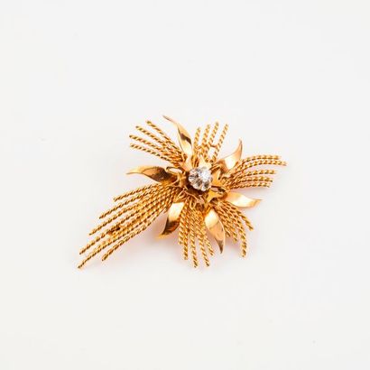 Broche gerbe en filins d'or jaune (750) torsadés,...