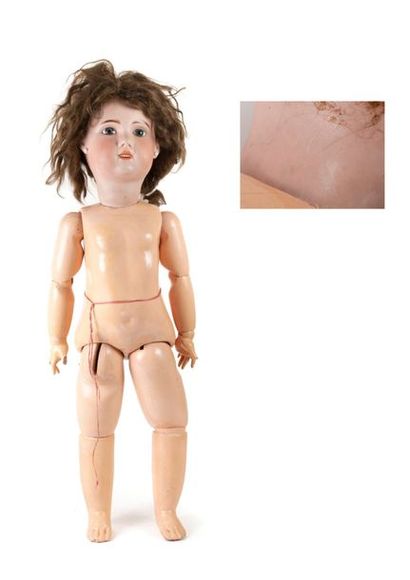 Poupée.

Tête en porcelaine, bouche ouverte...
