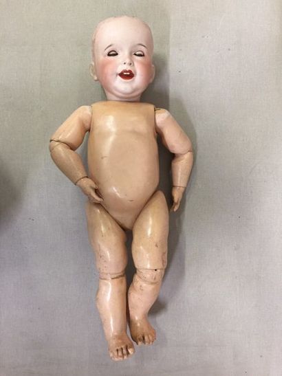 SFBJ


Grand poupon.

Tête en porcelaine,...