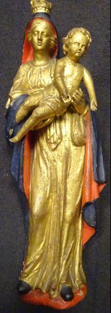 Vierge à l'Enfant.

Sculpture en bois redoré...