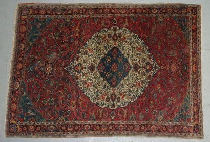 Tapis en laine à centre polylobé bleu et...