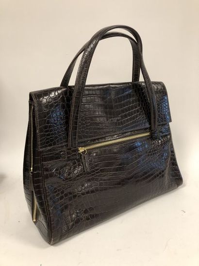 JUST CAMPAGNE

Sac en cuir marron façon crocodile...