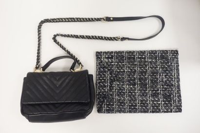 Sac à main en cuir noir à motif de chevrons....
