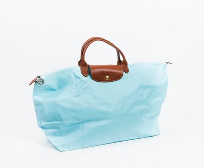 LONGCHAMP Pliage


Sac pliable en toile bleu...