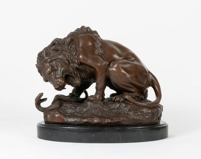 BUZON 


Lion attaquant un serpent. 

Epreuve...
