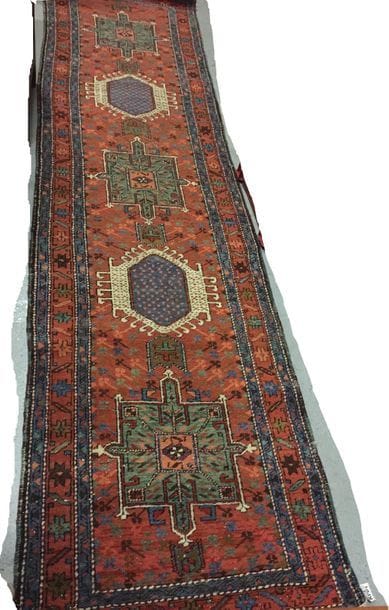 
Tapis galerie à 5 motifs géométriques principaux...