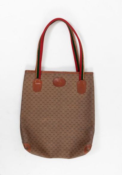 GUCCI


Sac cabas en toile enduite toile...