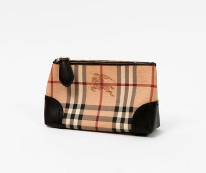 BURBERRY


Pochette en toile enduite à motif...