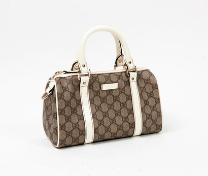 GUCCI


Sac bowling en toile siglée marron...