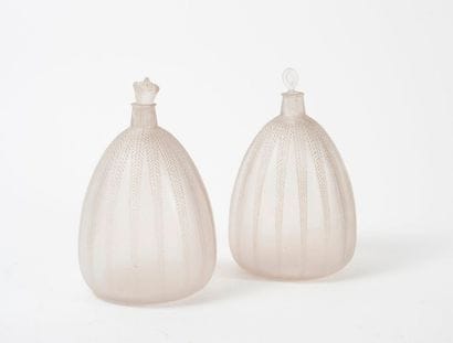 D'après René LALIQUE (1860-1945)


Deux vases...