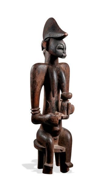 MALI

Personnage féminin portant son enfant...