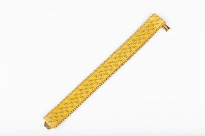 Bracelet manchette souple en or tressé, années...