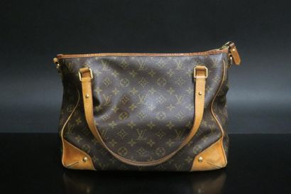LOUIS VUITTON. Sac à main en toile monogram...