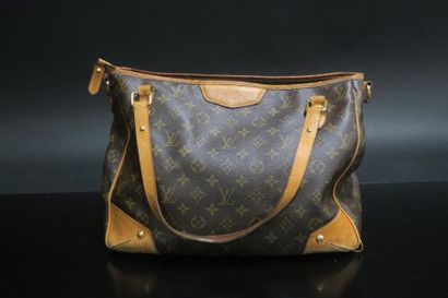 LOUIS VUITTON. Sac à main en toile monogram...
