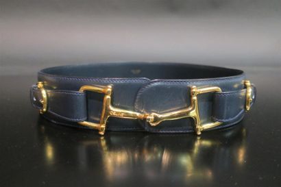 CELINE. 2 ceintures, l'une en cuir gold (boucle...