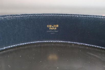 CELINE. 2 ceintures, l'une en cuir noir (boucle...