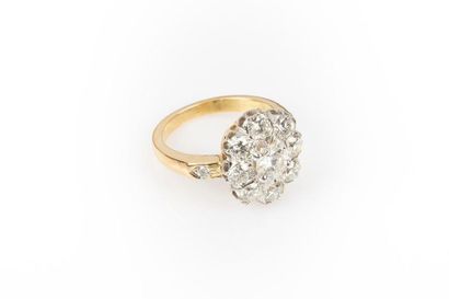 Bague en or de deux tons sertie d'un diamant...