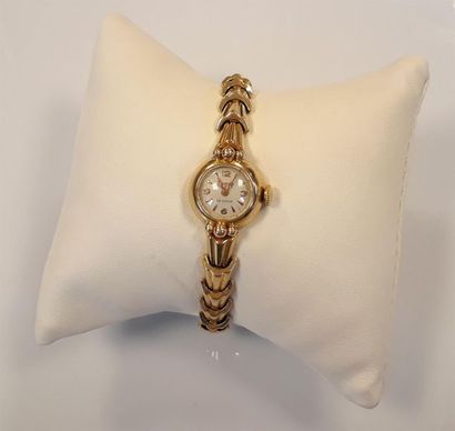 Bracelet-montre de dame en or, le bracelet...
