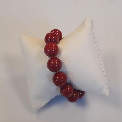Bracelet fantaisie teinté corail, fermoir...