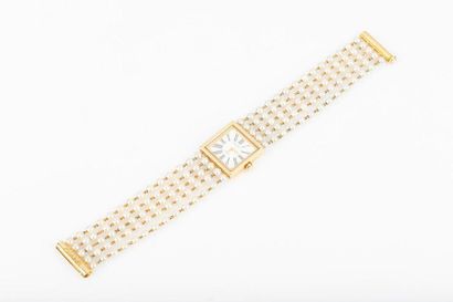 CHANEL. Bracelet-montre de dame en or modèle...