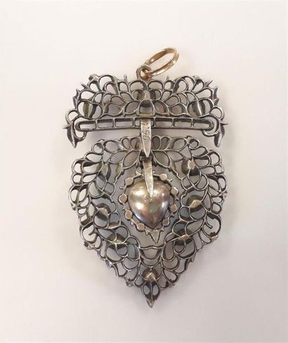 Pendentif mobile en or et argent serti de...