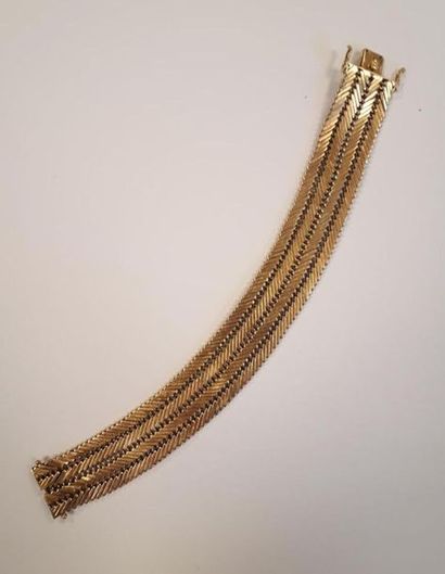 Bracelet manchette souple en or tressé, années...