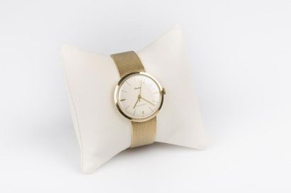 Bracelet-montre d homme en or, le bracelet...