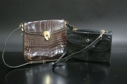 LANCEL. Sac à main en lézard noir - on y...